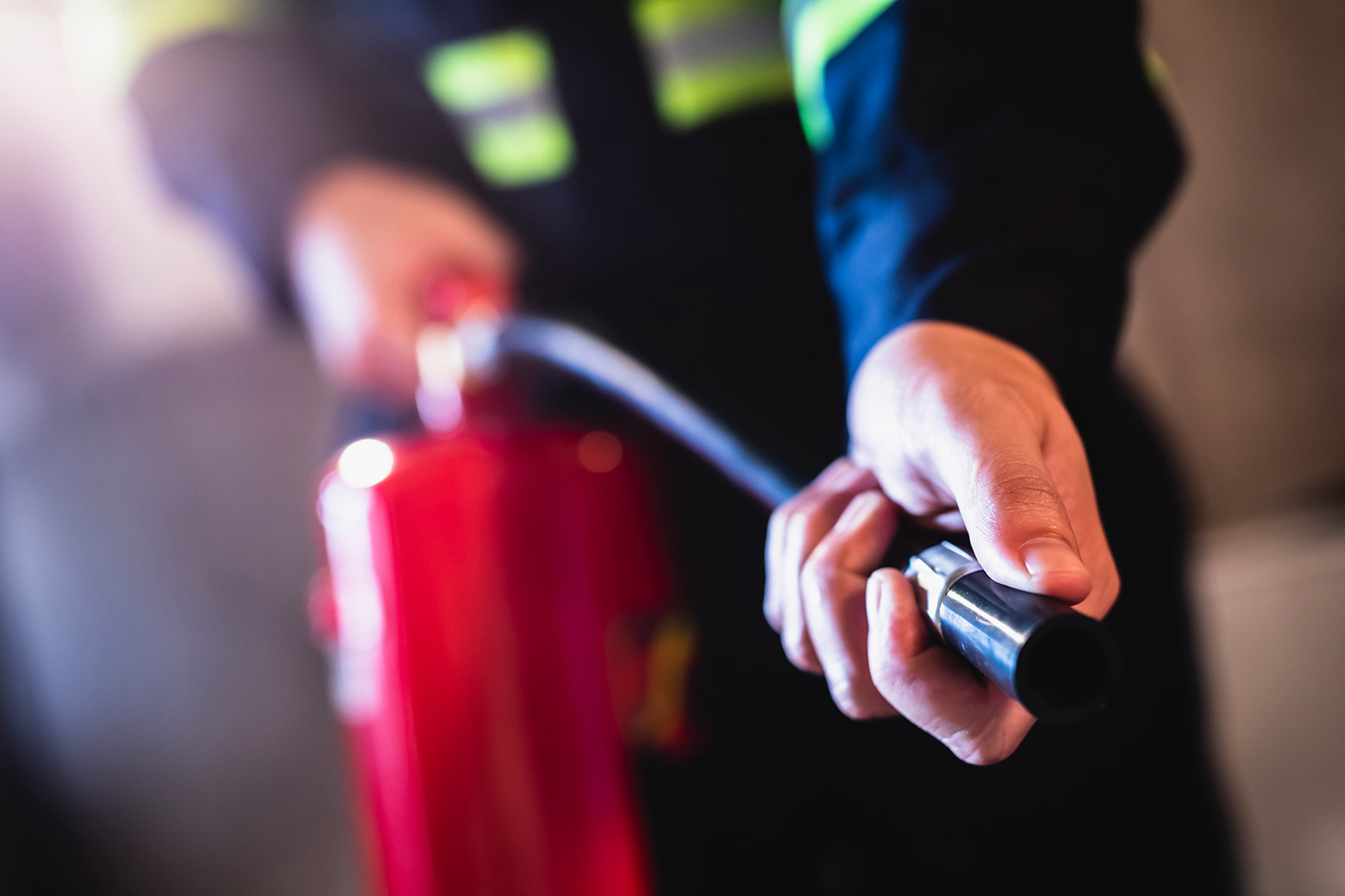 Operating a fire extinguisher