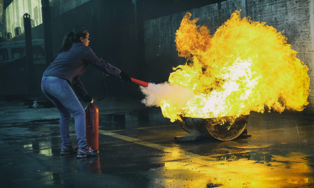 Tackling Fire with extinguisher